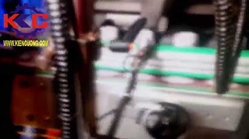 Máy phóng nhãn co màng dạng cốc lớn 75mm tự động - ly Rồng đỏ