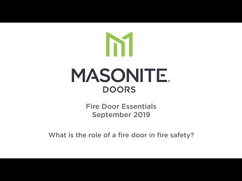 What is the role of a fire door in fire safety?