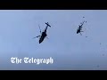 Military helicopters collide in malaysia during training session