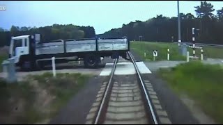 Train Passengers Brace for Impact After Truck Gets Stuck on Tracks [CAUGHT ON TAPE]