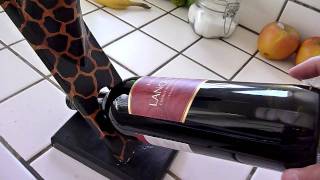 Video of wine bottle holder not holding the bottle of wine.
