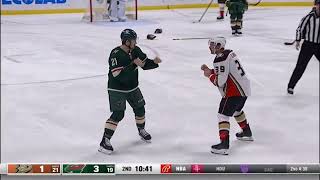 Sam Carrick drop the gloves with Brandon Duhaime for the hit thrown on Josh Manson