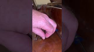 Installing music rack on piano during a piano tuning #piano #pianomusic #woodworking #tunerlife