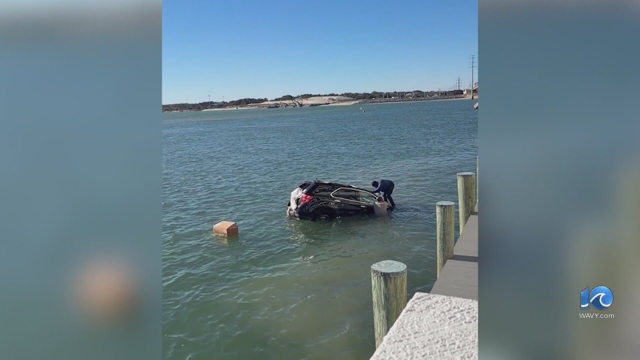 Heroic rescue in VB as driver saved from sinking SUV - YouTube
