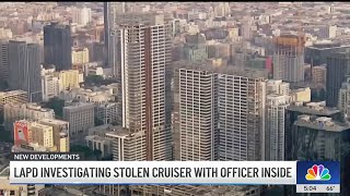 LAPD investigating stolen cruiser with officer inside