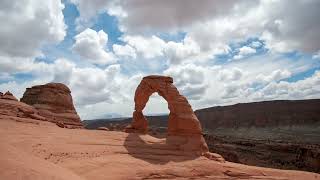 Time lapse of Delicate Arch against clouds moving in the sky FREE STOCK VIDEO