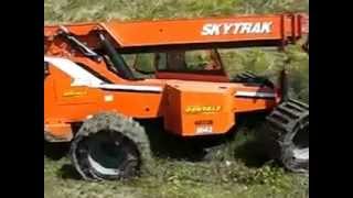 Telehandler Tracks (6) | Right Track Systems Int
For more information and quotes please visit http://www.righttracksystemsinc.com or phone us toll free at 1-855-481-9473.
Right Track Systems offer the only completely rebuildable all rubber telehandler track system for telehandlers and aerial lifts on the market today.
Since our tracks are completely customizable they can be made for any size of telehandler or aerial lift.
Our custom grouser design also allows a variety of configurations including ice cleats. This is a far superior alternative to molded rubber tracks giving you far better traction and easier installation.
Our product is like no other track product:
1. They are completely rebuildable
Unlike existing rubber tracks on the market our product is not a molded telehandler or aerial lift rubber track. Once grousers have worn down over many hours they can be replaced cheaply. After being replaced it is almost like having a brand new track. This is a much better design then a molded telehandler or aerial lift track which is simply a throw away once it has worn.
2. They minimize tire damage and flats
Our telehandler and aerial lift track design covers more tire surface area then any other over the tire track in the industry. Not only is the tread of the tire completely covered but most of the side wall as well by our patented steel tire guides. This almost completely eliminates any tire damage and flat tires.
3. They are completely customizable
Since our telehandler and aerial lift track system is custom made they can be adapted to any machine and made any length and width. This is of great benefit to you since we can manufacture a product that adapts to all your different lines of equipment such as skid steer tracks and bobcat tracks.
4. They eliminate tire spin
Once mud, sand or snow builds up inside a molded telehandler or aerial lift track the tire begins to spin, rendering the machine rather ineffective. The Right Track patented design has wear bars which grip the tire inside of the track. This completely eliminates tire slippage and greatly increases the efficiency of the machine.
5. They install easily
Unlike telehandler or aerial lift molded tracks which are one continuous piece our design is joined together with clips at each end. This makes installation as easy as taking the air out of your tires.
For more information and quotes please visit http://www.righttracksystemsinc.com or phone us toll free at 1-855-481-9473. Telehandler Tracks (6) | Right Track Systems Int