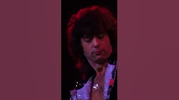 Jimmy page playing guitar