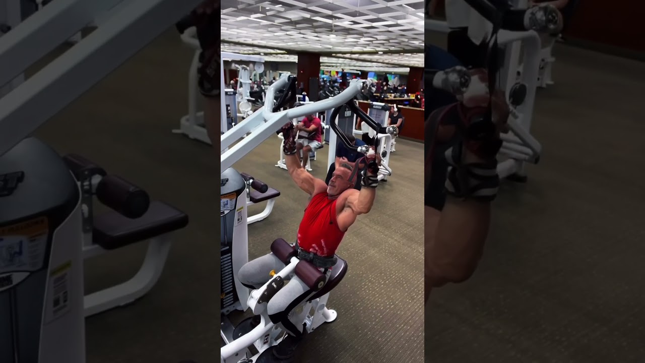 The most efficient way to work the width of the lat is to keep your chest up, lean back slightly