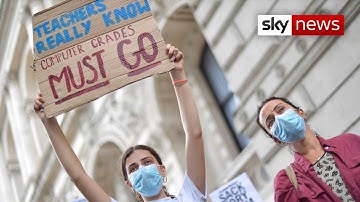 Threat of legal action and protests add to pressure over A-level row