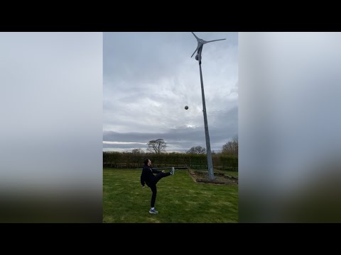 Kicking ball into wind turbine (IT GOES FLYING!!)