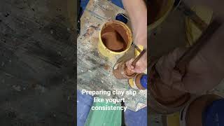 Clay Slip. Use old nylon stocking to remove any hard lumps for a perfectly smooth texture.