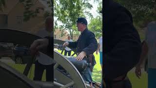 Civil War era cannon fires in front of Ritchie House in Topeka