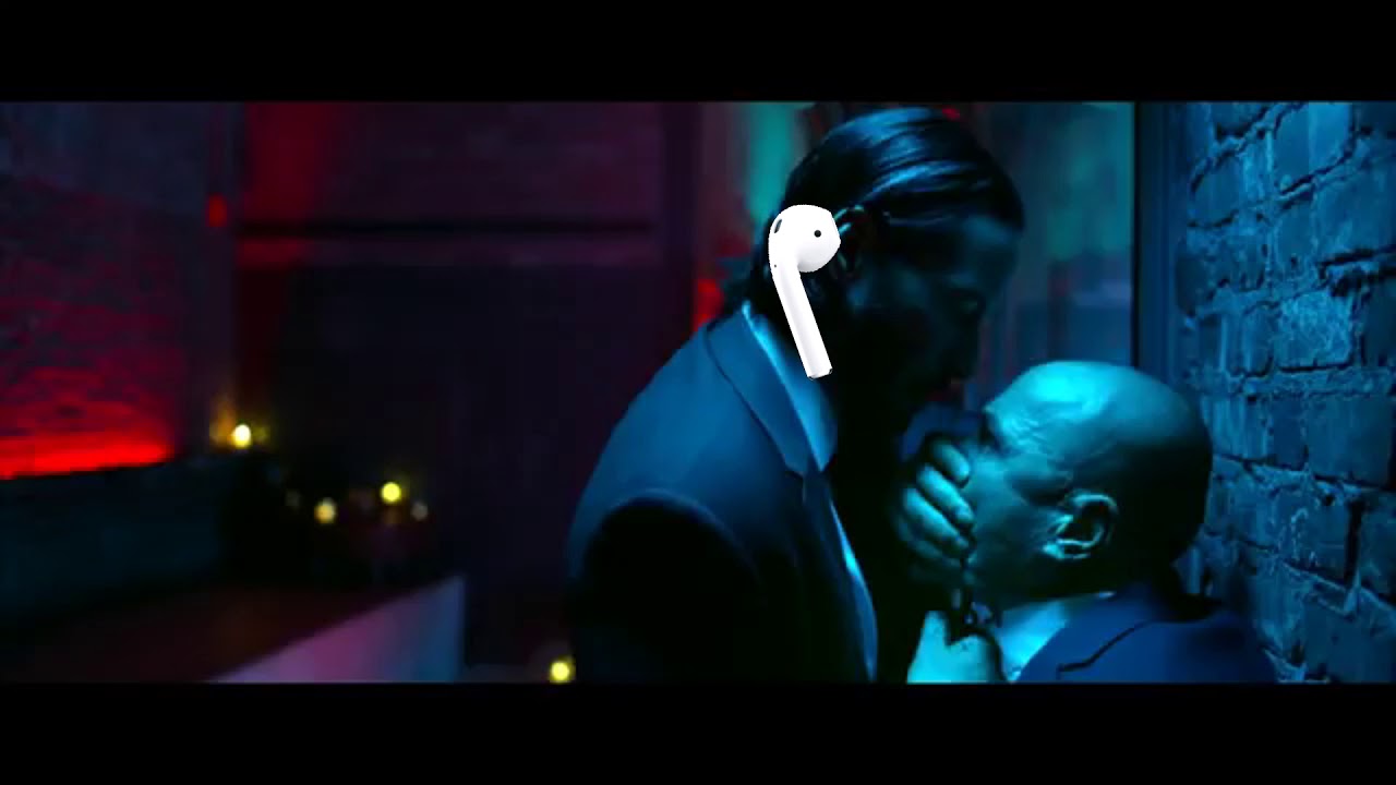 John Wick except he has AirPods in while he fights