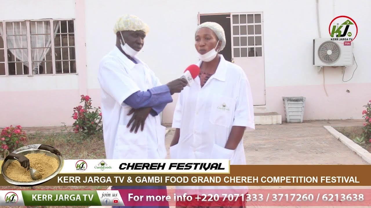 Hon. Awa Gaye, the manager of Gambi Foods Processing, shows us around the Women Resource Center
p2