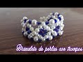 Brazalete de perlas con trompos