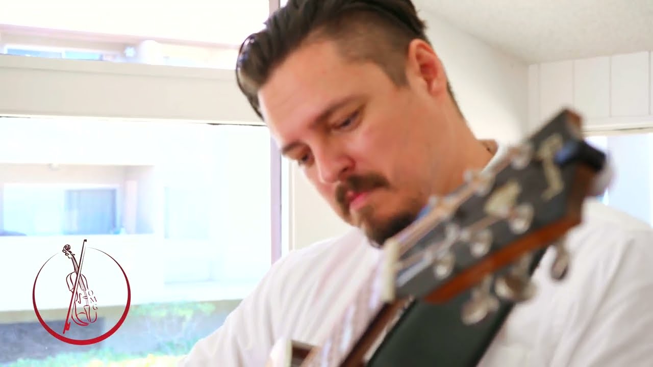 Lyle Performing Joy Spring By Clifford Brown On Guitar