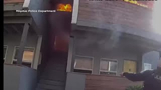 Toddler, dog tossed out window as family rescued from burning home