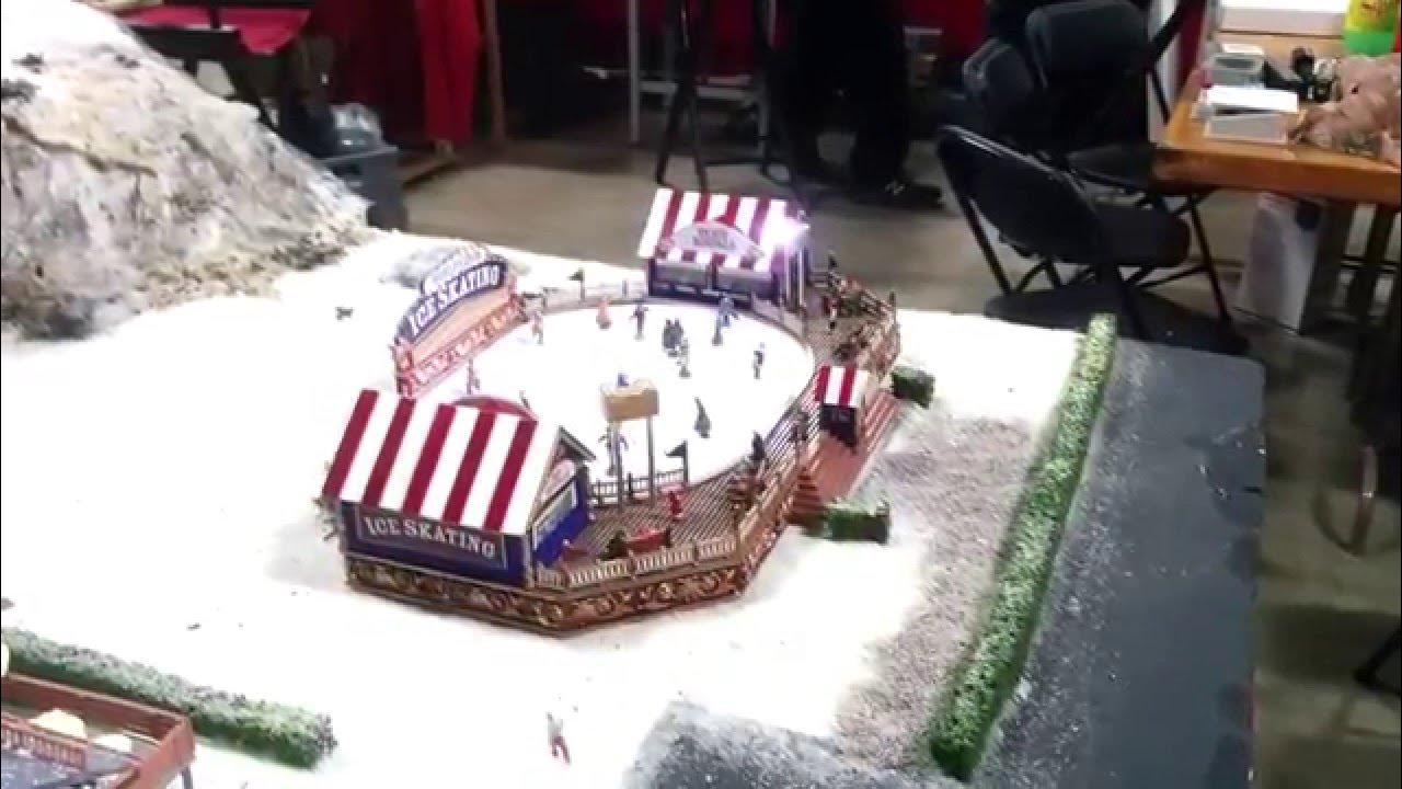 Ice Skating Rink & Ski Lift CloseUp of Model Train Snowy Mountain