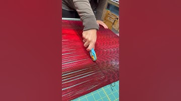Cutting off a warp and finishing three pieces for babywearing. #loomweaving #babywrap #babywearing