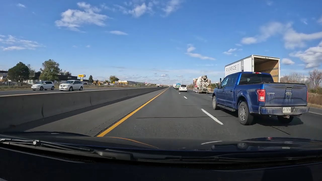 "Clear Sky Highway Ride: Scenic Drive Under the Open Blue Sky"