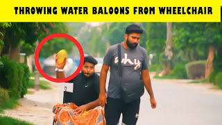 Throwing Water Balloons From Wheelchair | Water Baloon Prank | Sharik Shah