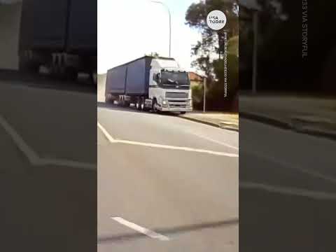 Caught on camera: Out of control truck takes out bus stop, light posts | USA TODAY #Shorts