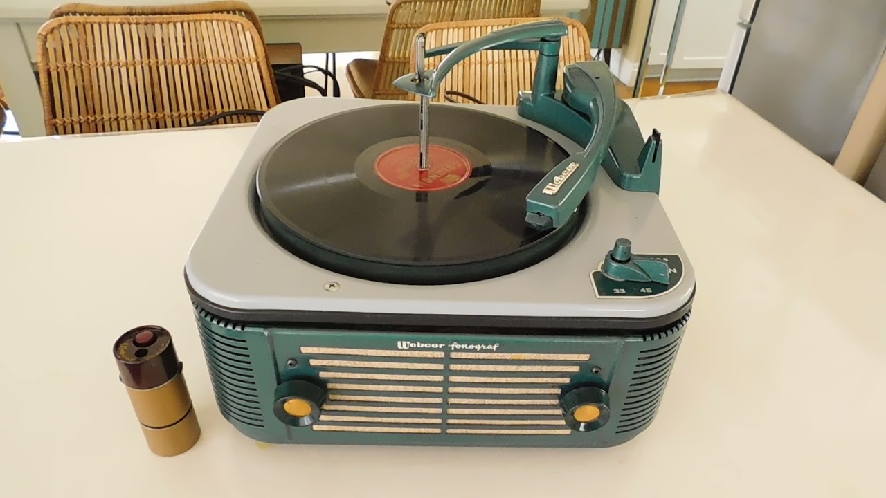 Webcor 3 speed automatic record player playing a 78 RPM record.