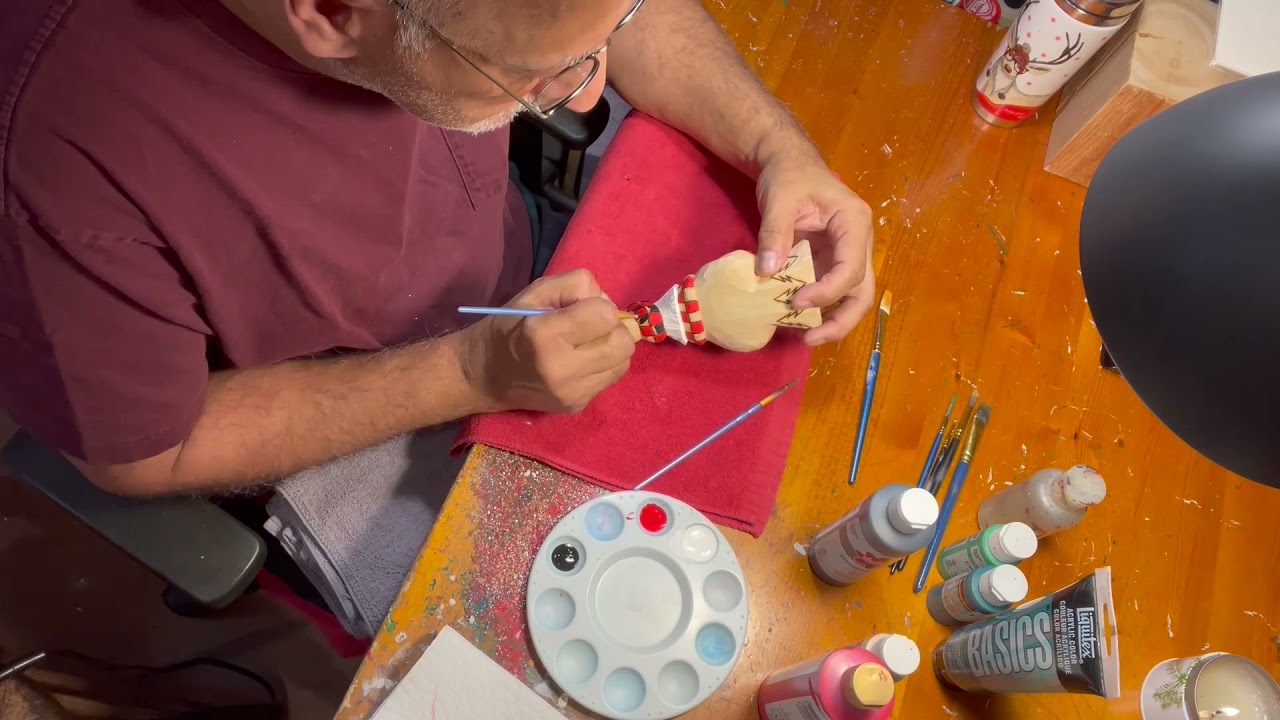 Dave Francis Carves the Tree Trimmed Tall Hat Santa