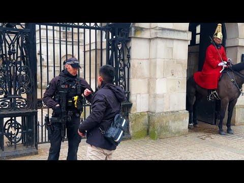 MOVE AWAY FROM THE KINGS GUARD! Armed Police Tell Off Tourists..