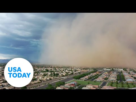 Dust storm blankets city before monsoon rains flood parts of Arizona | USA TODAY