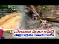 villagers risked their lives to save a woman and a child caught in a flash flood