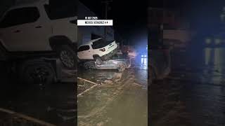 Heavy rains caused River to overflow, flooding town. Water rose 7 m, 4 m above danger level. #storm