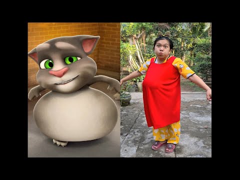 Video Mẹ Xí Muội áo vàng bắt chước mèo Tom ăn dưa hấu đỏ... - youtube