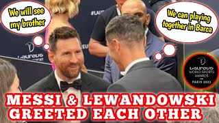Lionel Messi and Robert Lewandowski greet each other at Laureus Awards