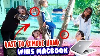 LAST TO REMOVE HAND WINS MACBOOK AND APPLE AIRPODS