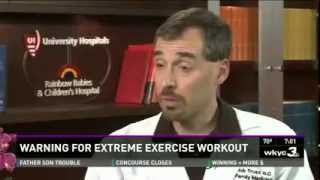 UH Case Medical Center's Dr. Robert Truax cross checks CrossFit workouts