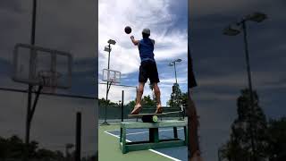 Guy Makes Various Basketball Trickshots While Balancing Himself on Rola-Bola - 1432685-1