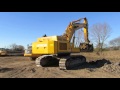 Hitachi ZX470 loading A30F and truck