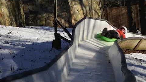 Tucker West on backyard luge track