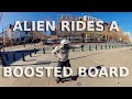 Alien Rides a boosted electric skateboard for the first time