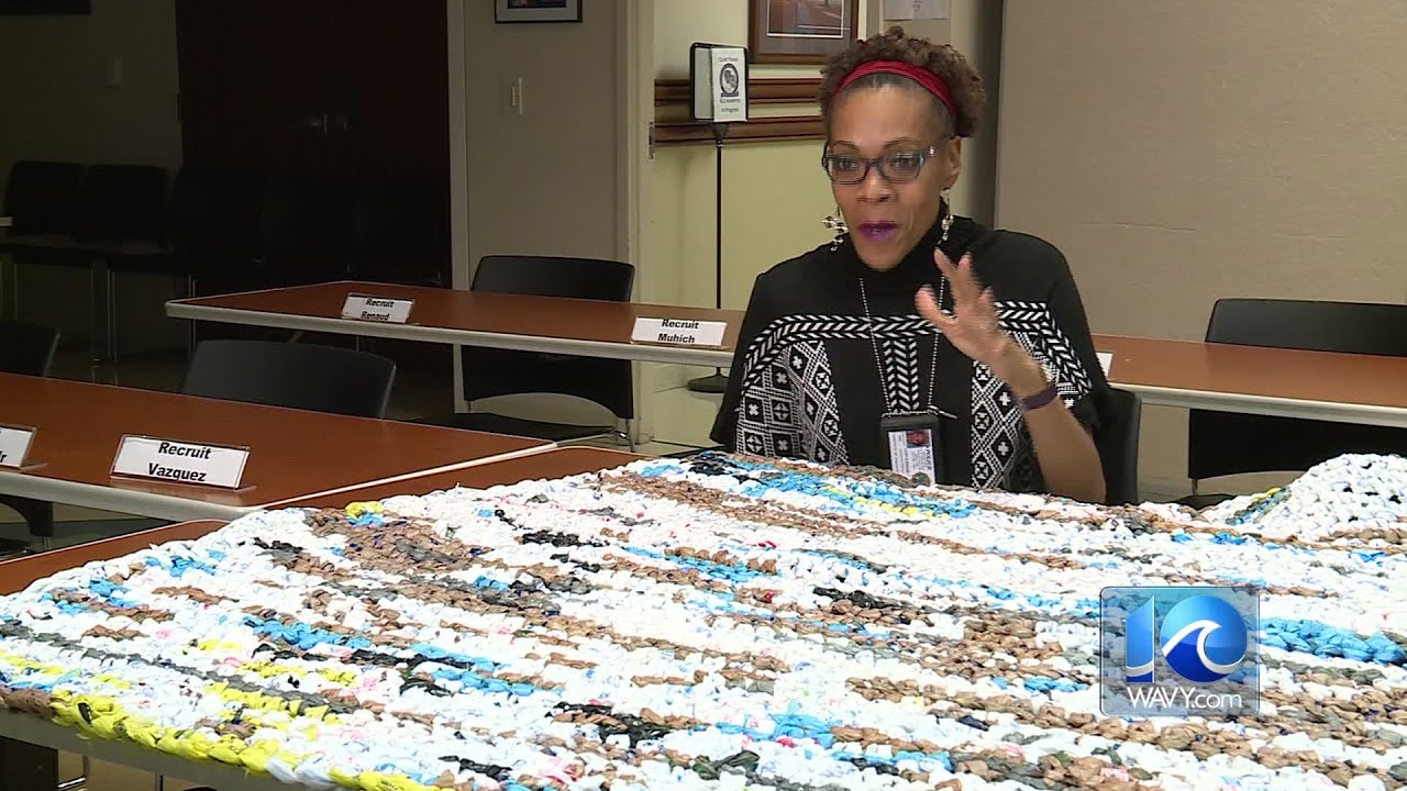 A woman is turning plastic bags into blankets, mats for the homeless