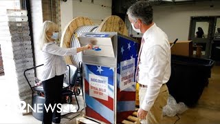Judge dismisses Arizona Republicans' bid to ban mail-in voting