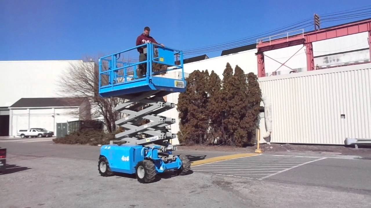 Genie GS - 3268RT 4WD Dual Fuel Scissor Lift - YouTube