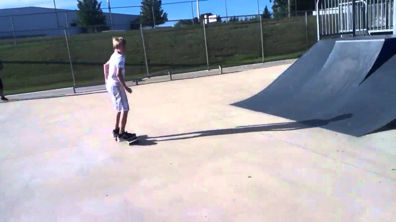 Ollie over trash can.