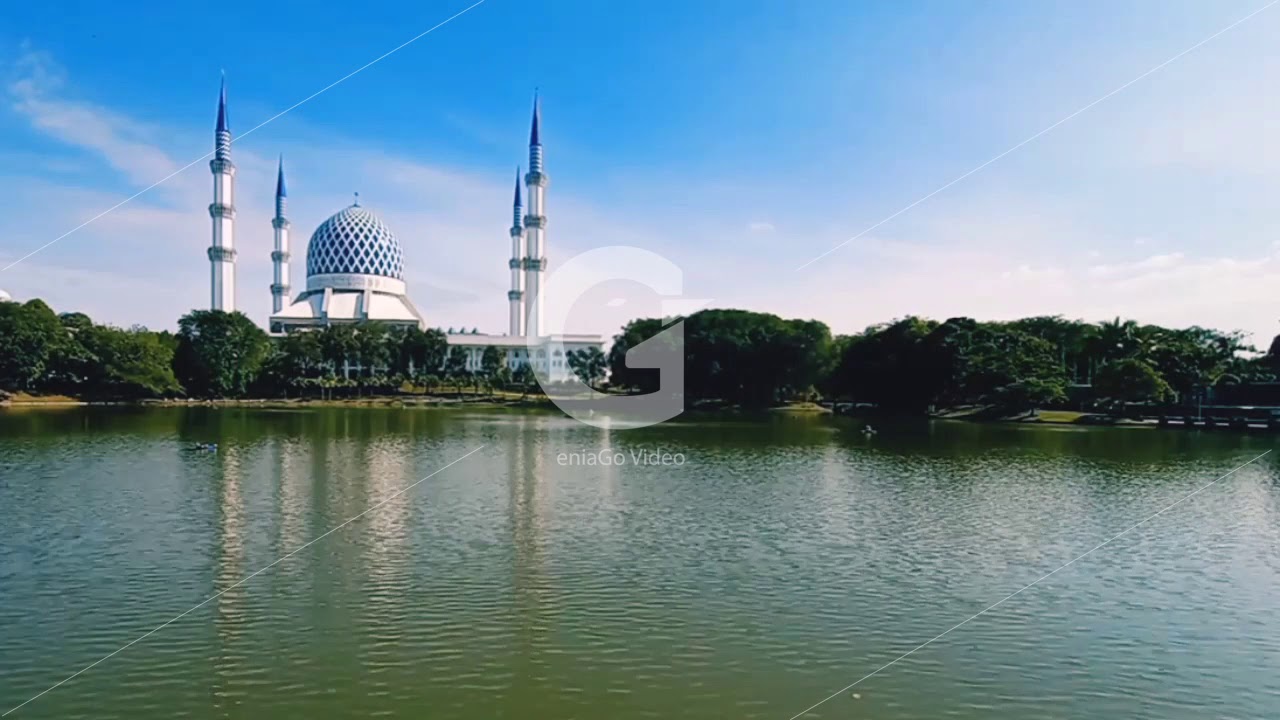 Calm lake water mosque view