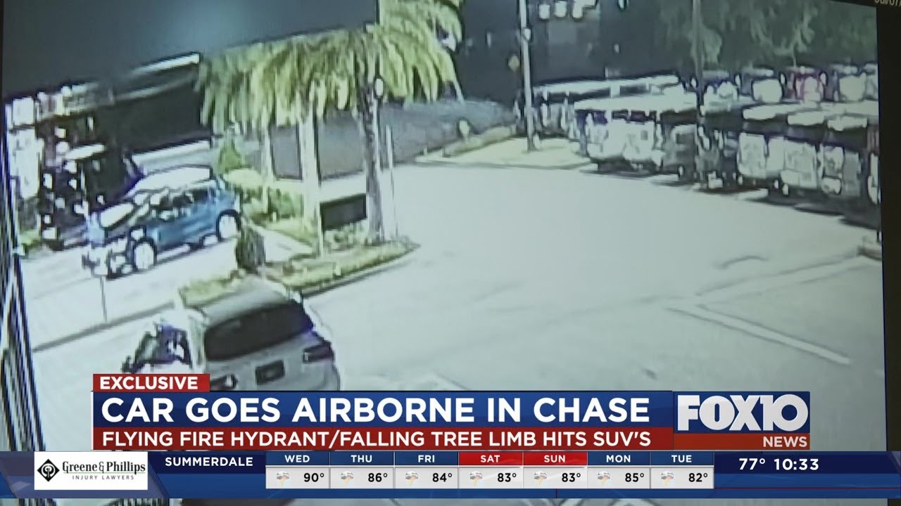 Car goes airborne during police chase YouTube