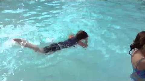 Dylan swimming.