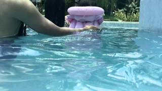Una swimming with the help of floaters 2