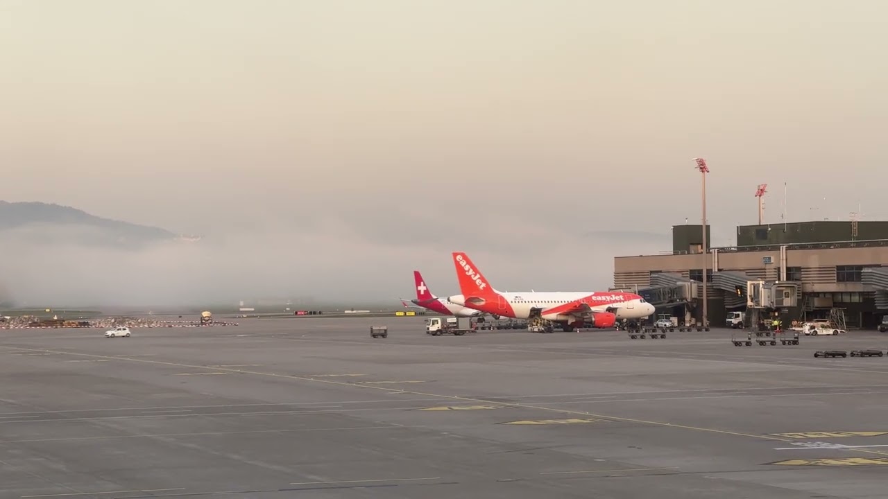 Helvetic Airways | Embraer E190 taxiing out at Zurich | EasyJet Airbus A320 Parked